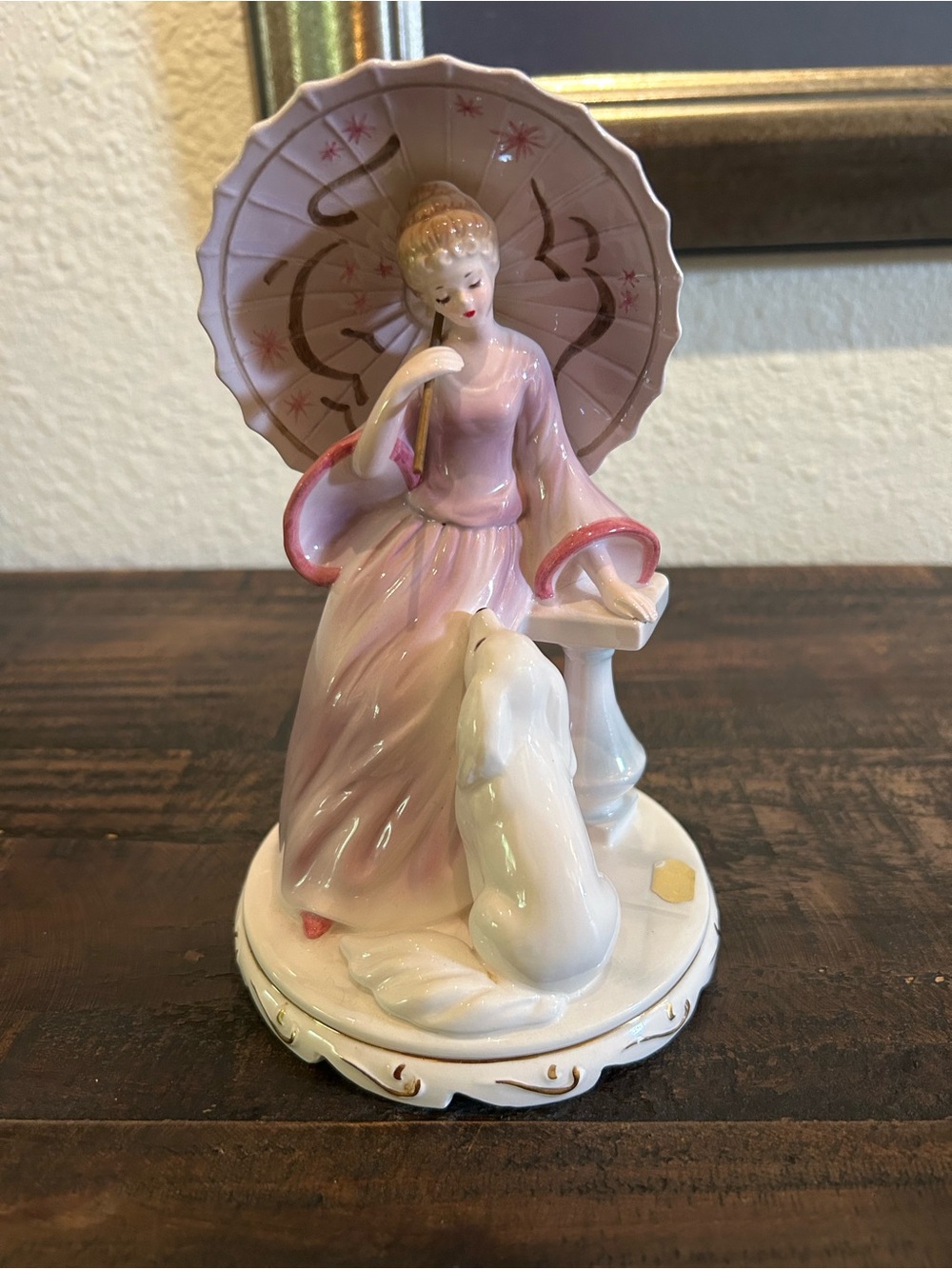 Porcelain Vintage Josef Original music box with Victorian lady and dog.